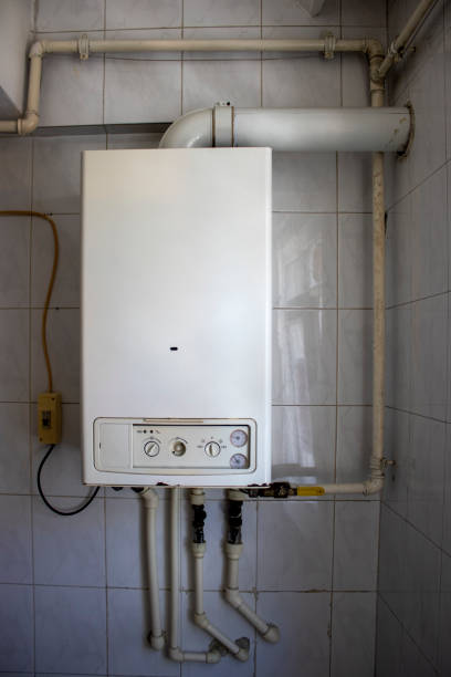 istock Modern Gas Boiler In The Kitchen 1253303495