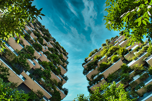 Milan, Italy, 06.29.2020: Vertical Forest (Bosco Verticale) Innovative Green House Skyscraper representing commitment to sustainable economy designed by Boeri Studio