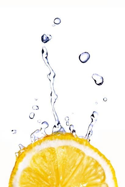 istock fresh water drops on lemon isolated on white 1253308602