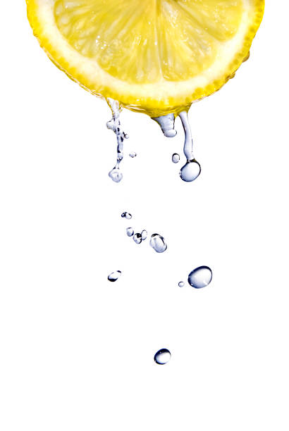 istock fresh water drops on lemon isolated on white 1253308616