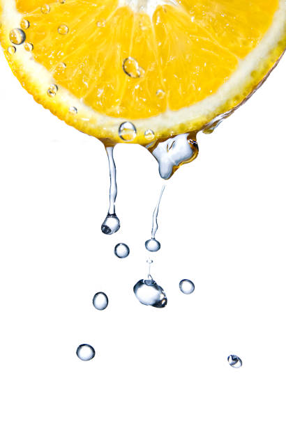istock fresh water drops on orange isolated on white 1253308626