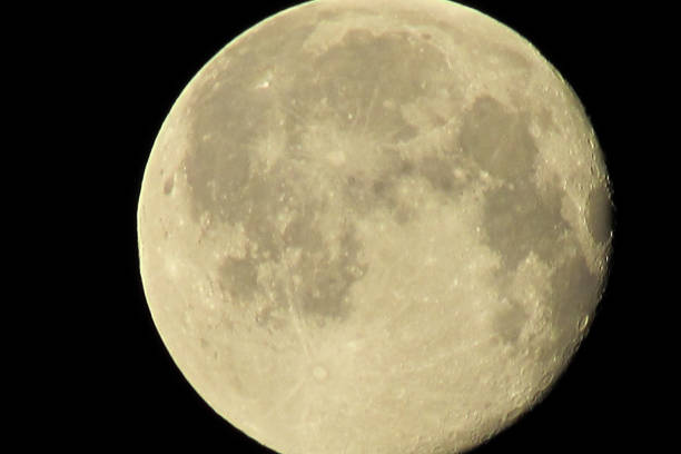 istock The moon in the dark sky close plan 1253316758