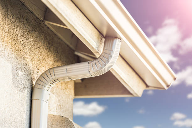 istock House with New Seamless Aluminum Rain Gutters 1253320109
