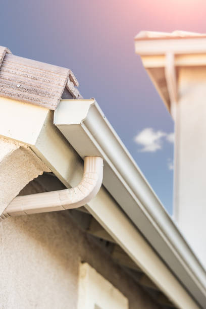 istock House with New Seamless Aluminum Rain Gutters 1253320117