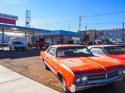 In July 2019, tourists could admire old garages on the Route 66in Kingman village, Arizona, USA.