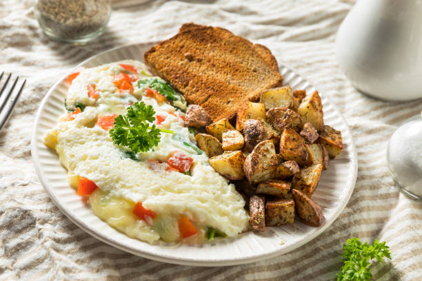 Healthy Homemade Eggwhite vegetarian Omlette Healthy Homemade Eggwhite vegetarian Omlette with Veggies egg white stock pictures, royalty-free photos & images