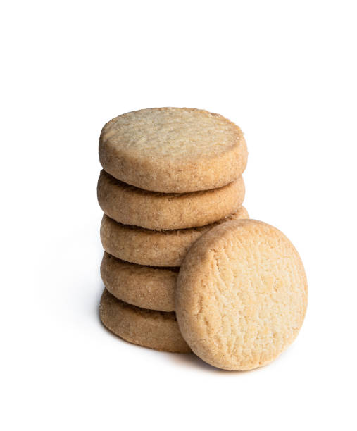 istock Stacked short pastry cookies isolated on white 1253324537