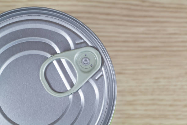 istock Tin can on wooden background 1253326938