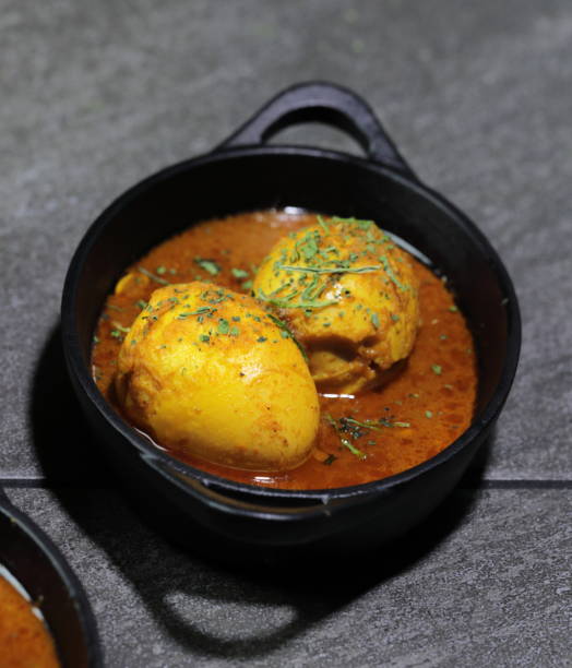 istock An Indian spread of spicy Egg curry or Egg Masala in a bowl 1253329716