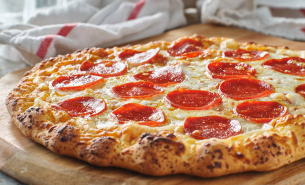 istock freshly baked pepperoni pizza made at home 1253329732