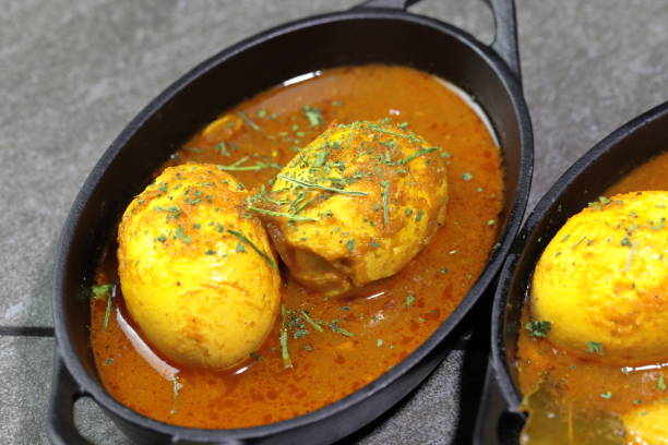 istock An Indian spread of spicy Egg curry or Egg Masala in a bowl 1253329738