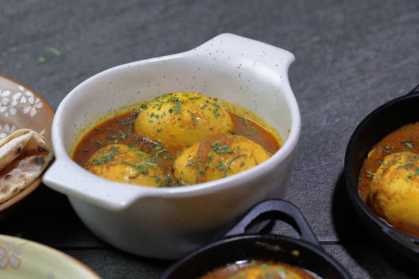 istock An Indian spread of spicy Egg curry or Egg Masala in a bowl 1253329840