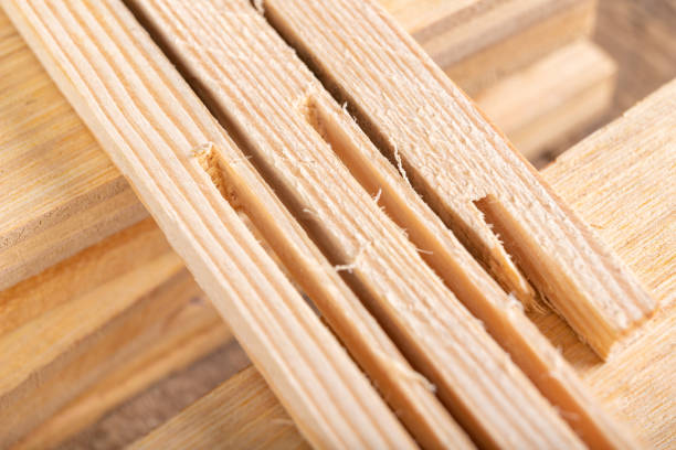 istock Raw board cut with a circular saw. Material prepared for work in the carpentry shop. Light background. 1253329854