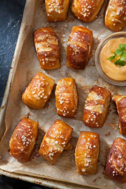 istock Soft Pretzel Bites with A Spicy, Cheesy Salsa Con Queso Dip 1253331770