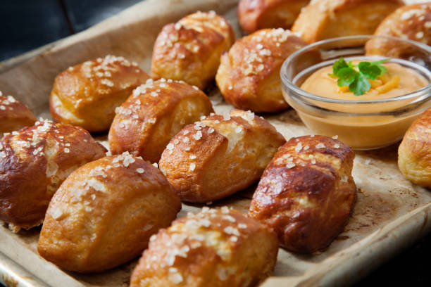 istock Soft Pretzel Bites with A Spicy, Cheesy Salsa Con Queso Dip 1253331797