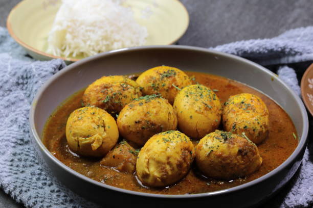 istock An Indian spread of spicy Egg curry or Egg Masala in a bowl 1253333518