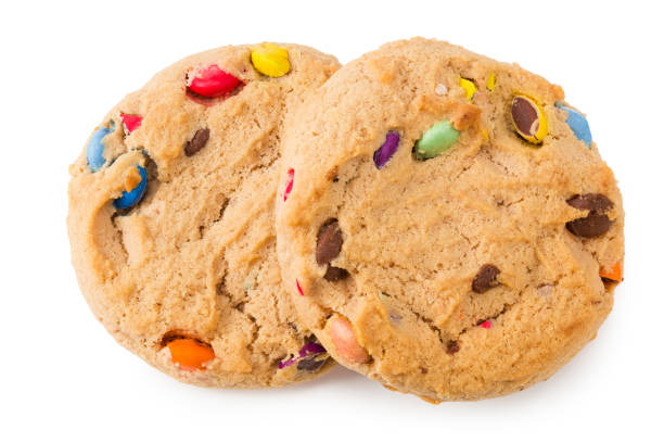 istock Chocolate chip cookies isolated on white background. Sweet biscuits. top view 1253336770