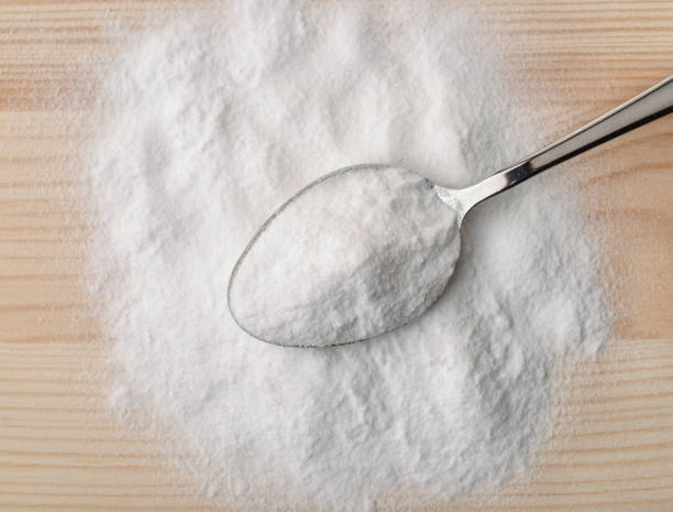 top view of spoon with baking soda - ground flour white heap imagens e fotografias de stock