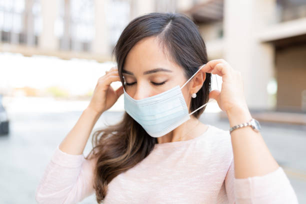 istock Caucasian Woman Wearing Face Mask 1253339326