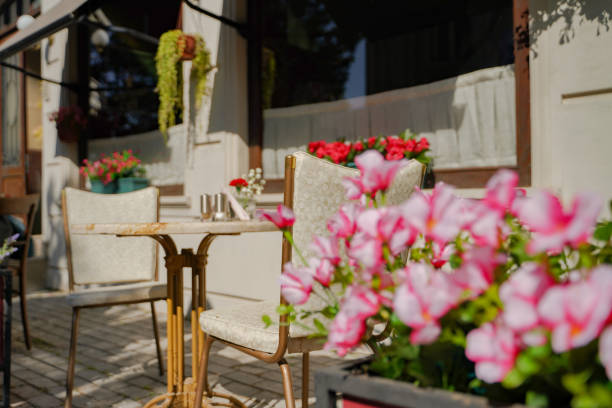istock table and chairs at a sidewalk cafe 1253339344