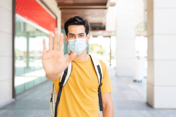istock Young Man Wearing Face Mask In City 1253339873