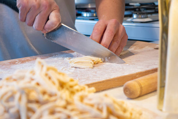 istock Homemade noodle cutting 1253340191