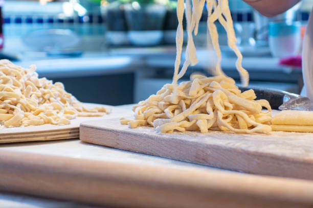 istock Homemade noodle cutting 1253340318