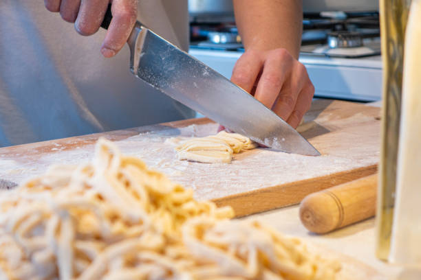 istock Homemade noodle cutting 1253343081
