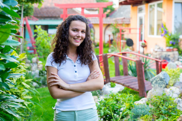 istock Woman in the garden 1253344402
