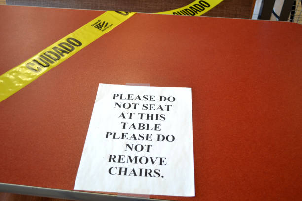 istock Please Do Not Seat At This Table - Please Do Not Remove Chairs Signage 1253344498
