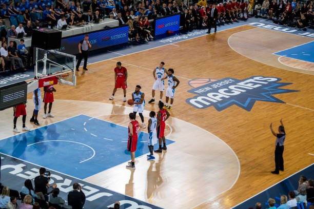 istock Basketball player taking penalty shot 1253345319