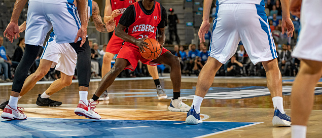 American basketball sports Live concept with TV monitor illustrating latest VR streaming technology and realistic HD ball in flight.