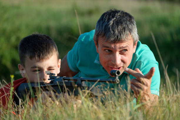 istock Father and Son Rifle Lessons 1253349044