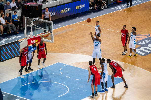 istock Basketball player taking penalty shot 1253349062