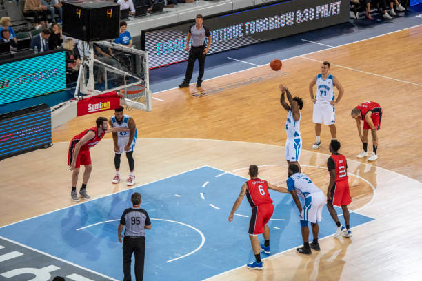 istock Basketball player taking penalty shot 1253349328