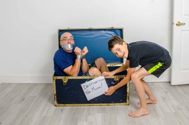 istock Boy expediting father on the Moon 1253350206