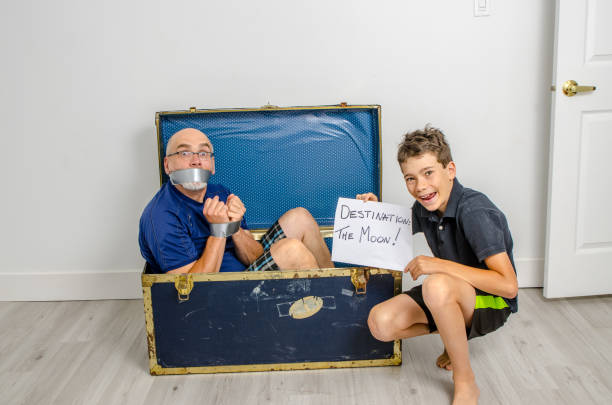istock Boy expediting father on the Moon 1253350237