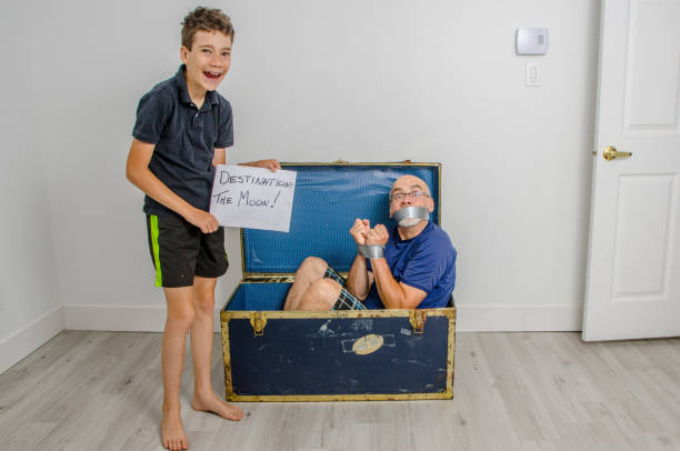 istock Boy expediting father on the Moon 1253350335
