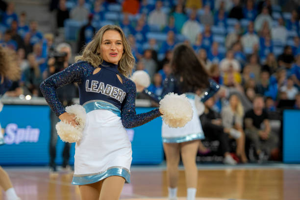 istock Cheerleaders performing on basketball court 1253351282