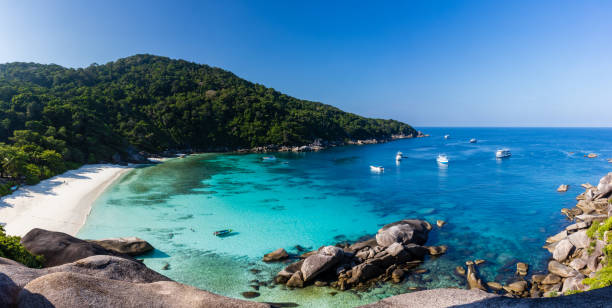istock Beautiful tropical beach and ocean on a small island (Similan Islands) 1253351372