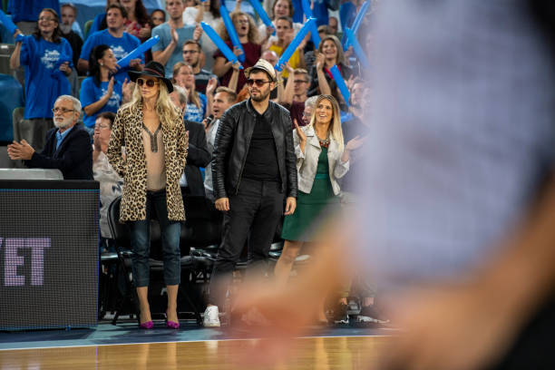 Celebrities watching basketball match Celebrities watching basketball match at stadium. celebrity fans stock pictures, royalty-free photos & images