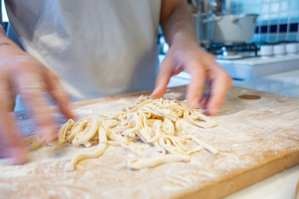 istock Homemade noodle cutting 1253352183
