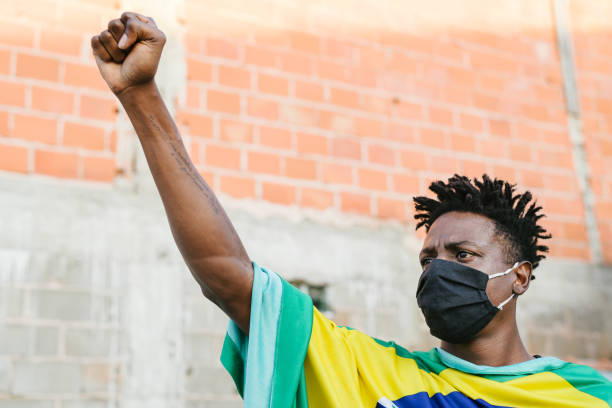 jovem brasileiro durante protesto - consciencia negra - fotografias e filmes do acervo