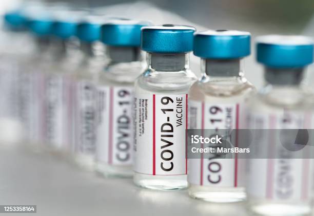 Covid19 Coronavirus Vaccine Vials In A Row Macro Close Up Stock Photo - Download Image Now