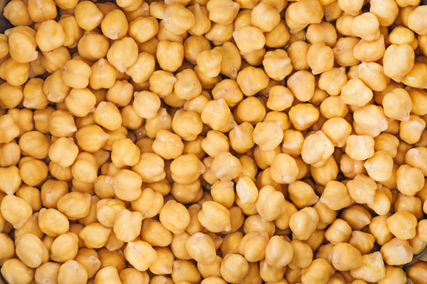 istock Gold beans of chick peas, closeup 1253365781