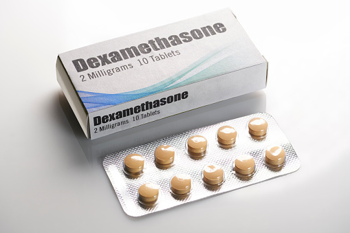 Dexamethasone: Box with pills of Covid-19 immune suppression drug. Generic drug. Not brand name. Fake label created by photographer in graphics program. Not copyrighted design.
