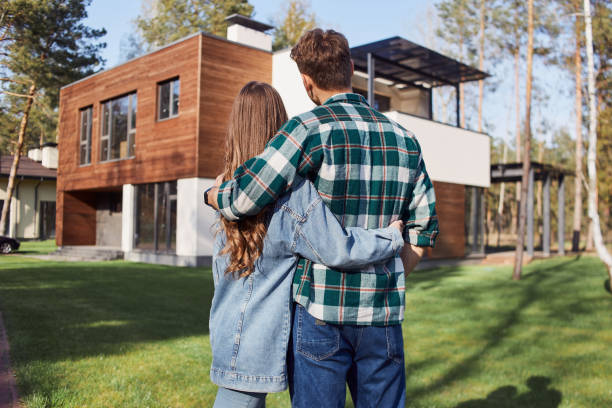 istock Loving couple choosing a new home for themself 1253375780