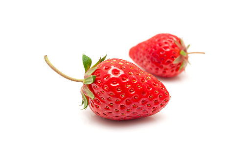 Fresh strawberry close-up isolated on white