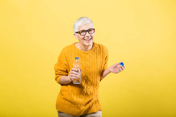 istock Senior woman having fun 1253390407
