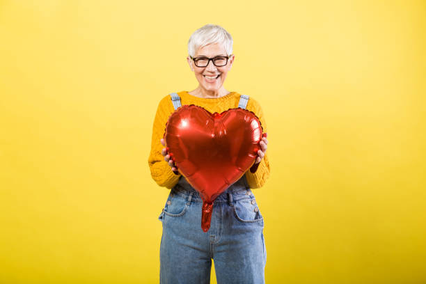 istock Happy woman spreading love 1253390450